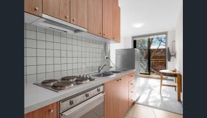 Kuchyň nebo kuchyňský kout v ubytování Peak 203B - Mt Buller Apartment + 1 fotografie