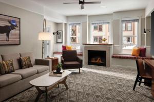 a living room with a couch and a fireplace at Marriott Summit Watch 2BD Sleeps up to 8 in Park City