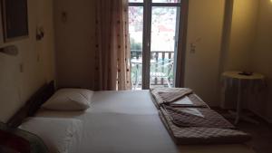 A bed or beds in a room at Atelier