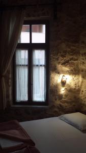 A bed or beds in a room at Atelier