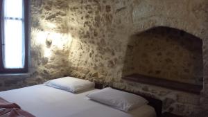 A bed or beds in a room at Atelier