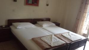 A bed or beds in a room at Atelier