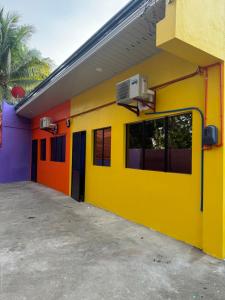 a brightly colored house with a colorful exterior at AGs Place in Tagbilaran City
