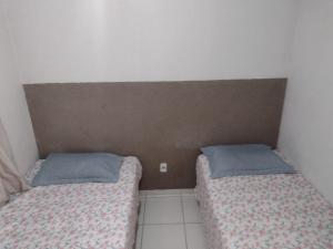 Ένα ή περισσότερα κρεβάτια σε δωμάτιο στο A 6 km do shopping sul Valparaiso, 7