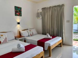 Postel nebo postele na pokoji v ubytování Sunshine Stay Panglao + 37 fotografií