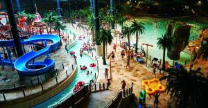 an overhead view of a water park with people in it at Lalandia Billund in Billund