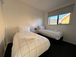 Letto o letti in una camera di Luminous Tekapo