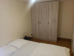 Postel nebo postele na pokoji v ubytování Chez Fanfan