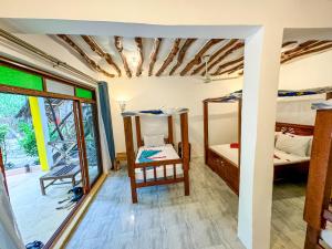 Letto o letti in una camera di Sagando Bungalows Zanzibar