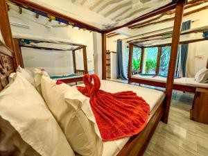 Letto o letti in una camera di Sagando Bungalows Zanzibar