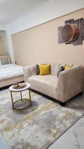 Posezení v ubytování Cozy Studio in Kilimani near Yaya Center