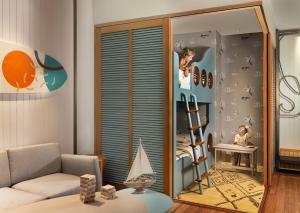 a living room with a mirror and a couch at Holiday Inn Resort Bali Canggu by IHG in Canggu