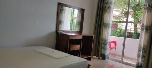Postel nebo postele na pokoji v ubytování Empire Valley Hotel