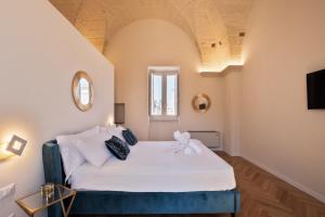 Postel nebo postele na pokoji v ubytování Relais Luxury Xenia
