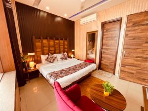 Hotel Pearl Grand-Family Hotel-Feel Like home客房内的一张或多张床位