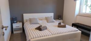 Кровать или кровати в номере Apartment "MANNA