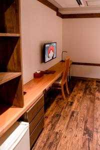 TV a/nebo společenská místnost v ubytování 都電屋 TodenHotel