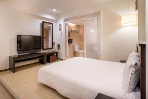 TV a/nebo společenská místnost v ubytování Guide Hotel Kaohsiung Shinkuchan