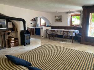 Posezení v ubytování Appartamenti Maison Guyon