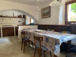 Kuchyň nebo kuchyňský kout v ubytování Appartamenti Maison Guyon