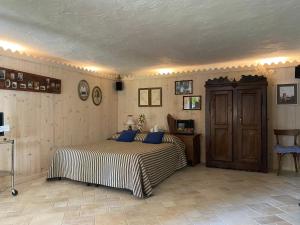 Postel nebo postele na pokoji v ubytování Appartamenti Maison Guyon