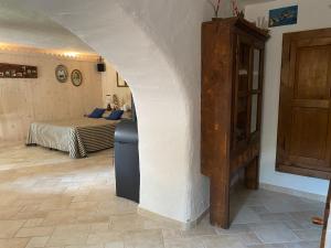 Postel nebo postele na pokoji v ubytování Appartamenti Maison Guyon