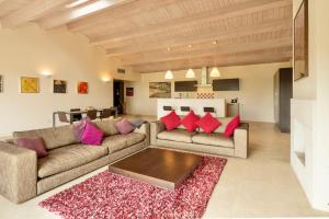 Posezení v ubytování ISA - Luxury Resort with swimming pool immersed in Tuscan nature, Villas on the ground floor with private outdoor area with panoramic view