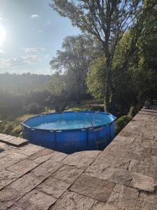 a blue tub sitting on top of a roof at Villa Lavandula in Malko Trŭnovo