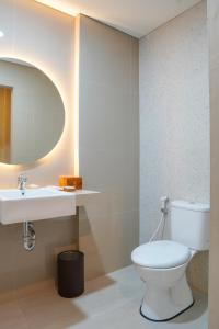 Kupatilo u objektu Sajiwa Inn and Suite Hotel
