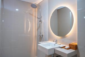 Kupatilo u objektu Sajiwa Inn and Suite Hotel