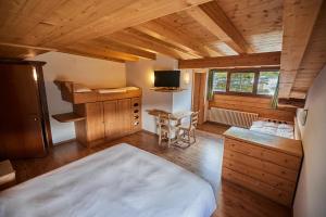 Postel nebo postele na pokoji v ubytování Hotel Vallechiara + 37 fotografií
