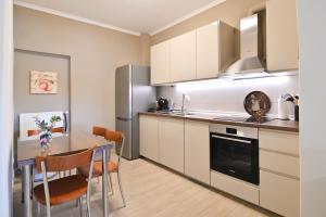 Kuchyň nebo kuchyňský kout v ubytování Filios Apartment