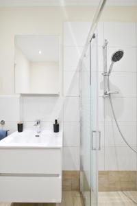 Koupelna v ubytování Filios Apartment + 30 fotografií
