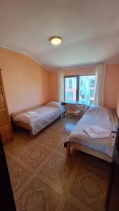 Postel nebo postele na pokoji v ubytování COCO Coworking & Coliving