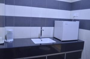 Kuchyň nebo kuchyňský kout v ubytování LSH Rest House