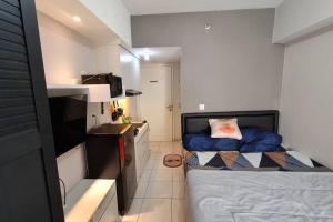 Katil atau katil-katil dalam bilik di Studio with pool & next to mall