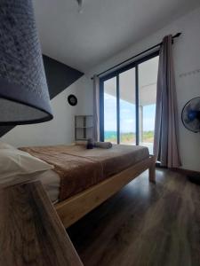 Postel nebo postele na pokoji v ubytování Location saisonnière Caza Villana
