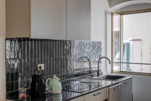 Η κουζίνα ή μικρή κουζίνα στο Palazzo BordiLand 1