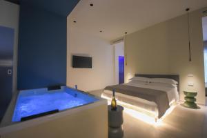 Ένα ή περισσότερα κρεβάτια σε δωμάτιο στο CA VI Loft