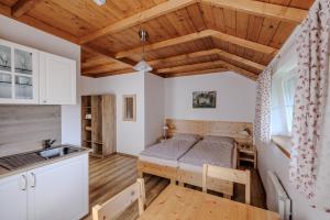 Postel nebo postele na pokoji v ubytování Resort Vysoká Lípa