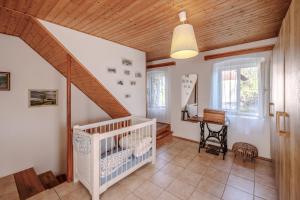 Postel nebo postele na pokoji v ubytování Resort Vysoká Lípa