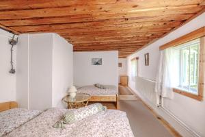 Postel nebo postele na pokoji v ubytování Resort Vysoká Lípa