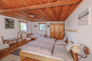 Postel nebo postele na pokoji v ubytování Resort Vysoká Lípa