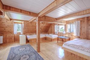 Postel nebo postele na pokoji v ubytování Resort Vysoká Lípa
