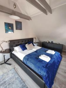 Posteľ alebo postele v izbe v ubytovaní Kosmos 9 - Apartament Astro by Rentoom