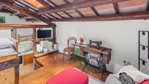 TV a/nebo společenská místnost v ubytování Casa Corona