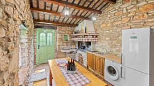 Kuchyň nebo kuchyňský kout v ubytování Casa Corona