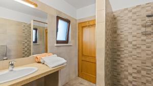 Kúpeľňa v ubytovaní Villa Nira