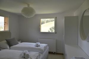 Postel nebo postele na pokoji v ubytování Wohnung am Heimberg