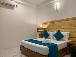 Ένα ή περισσότερα κρεβάτια σε δωμάτιο στο Trinco Beach Resort